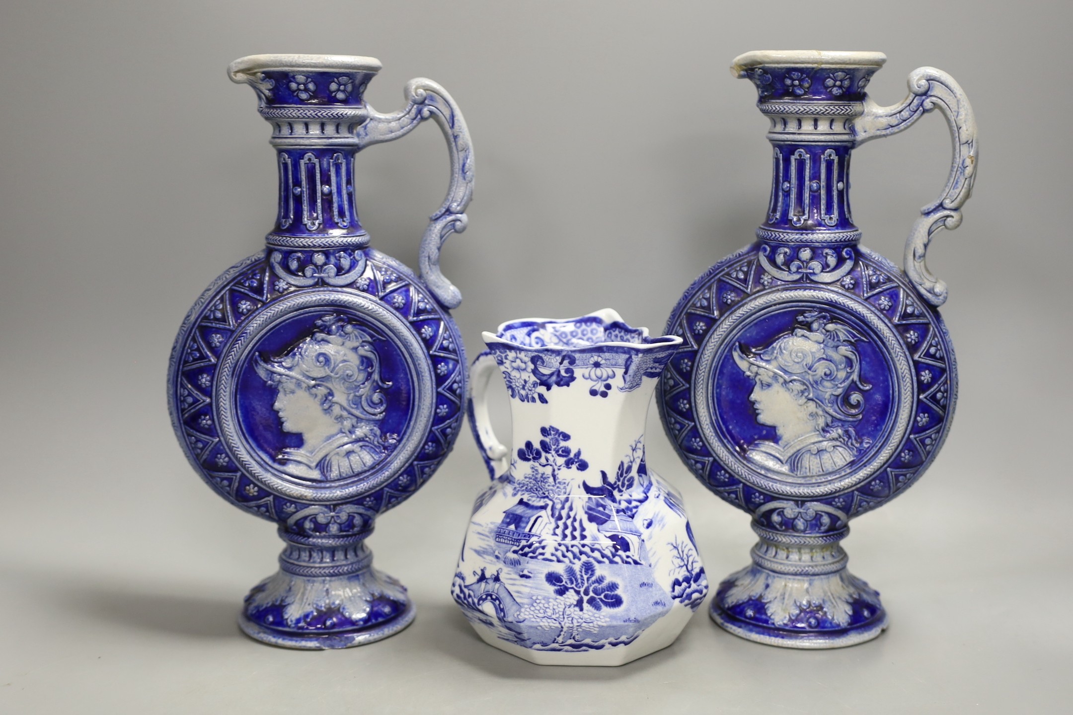 A pair of Royal Copenhagen plates, a pair of German pottery ewers a blue and white dish and pickle dish, plates 25 cms diameter.